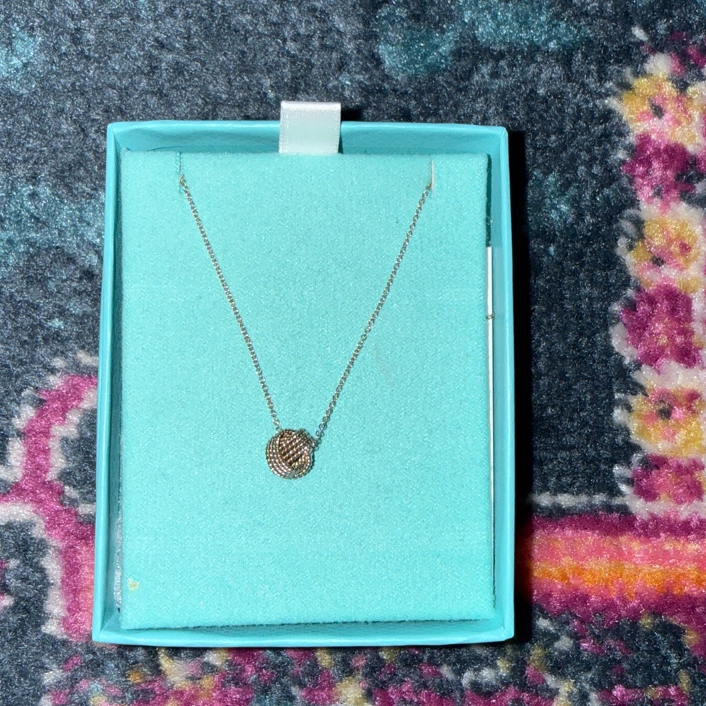 Tiffany & Co. Sterling silver twist knot necklace.